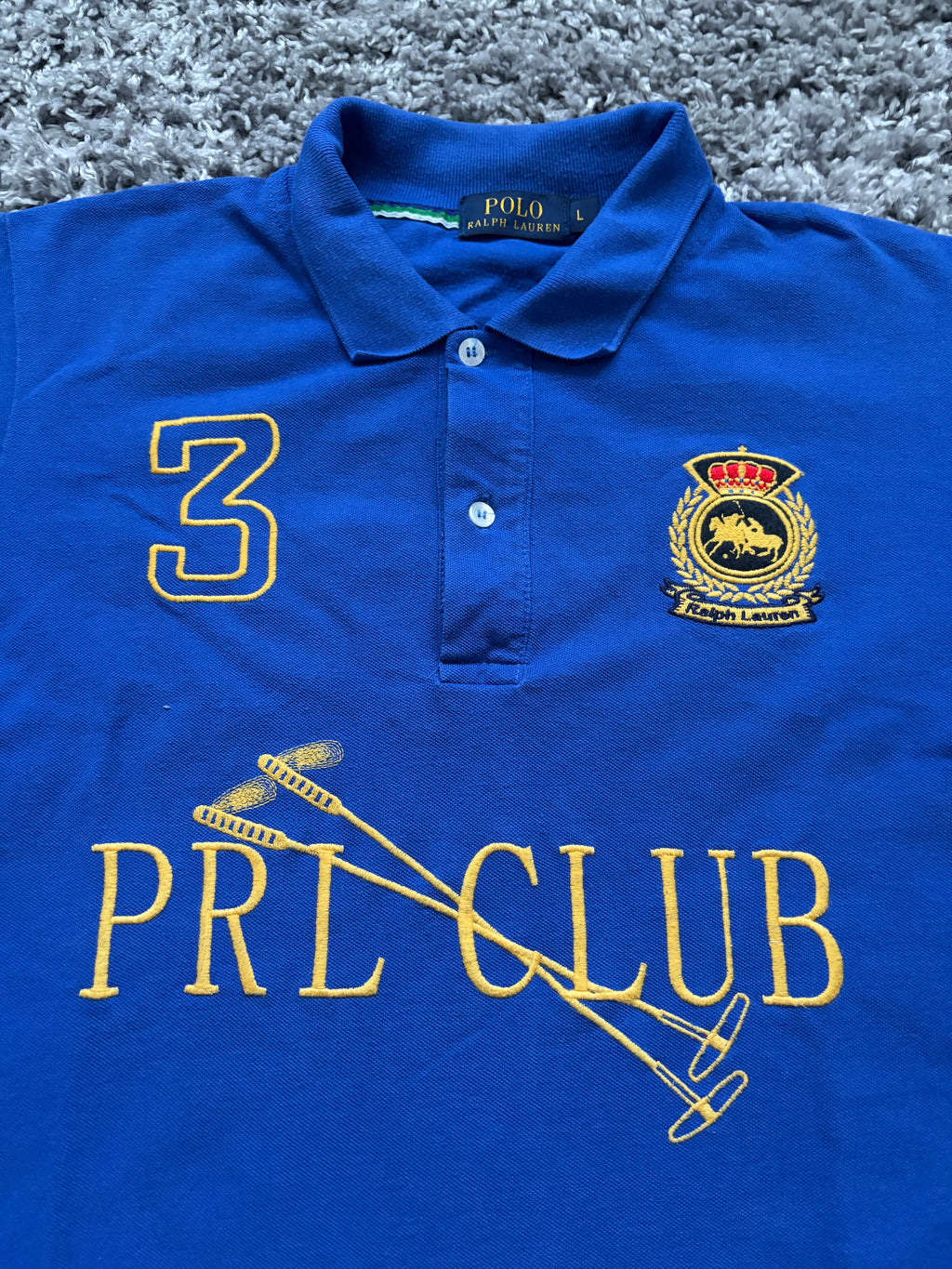 Ralph Lauren Polo (L)