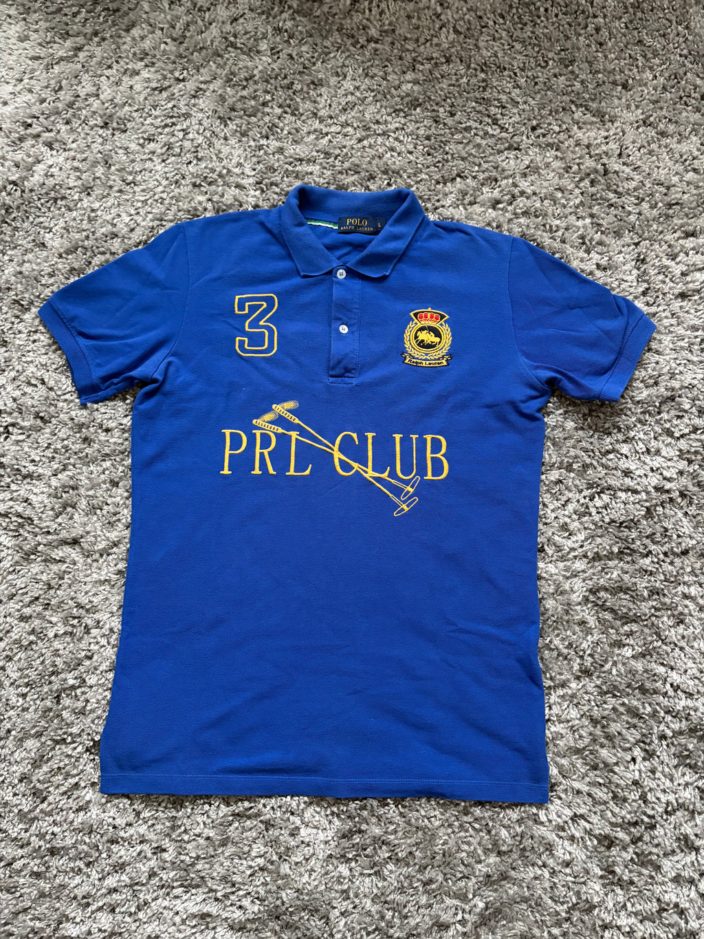 Ralph Lauren Polo (L)